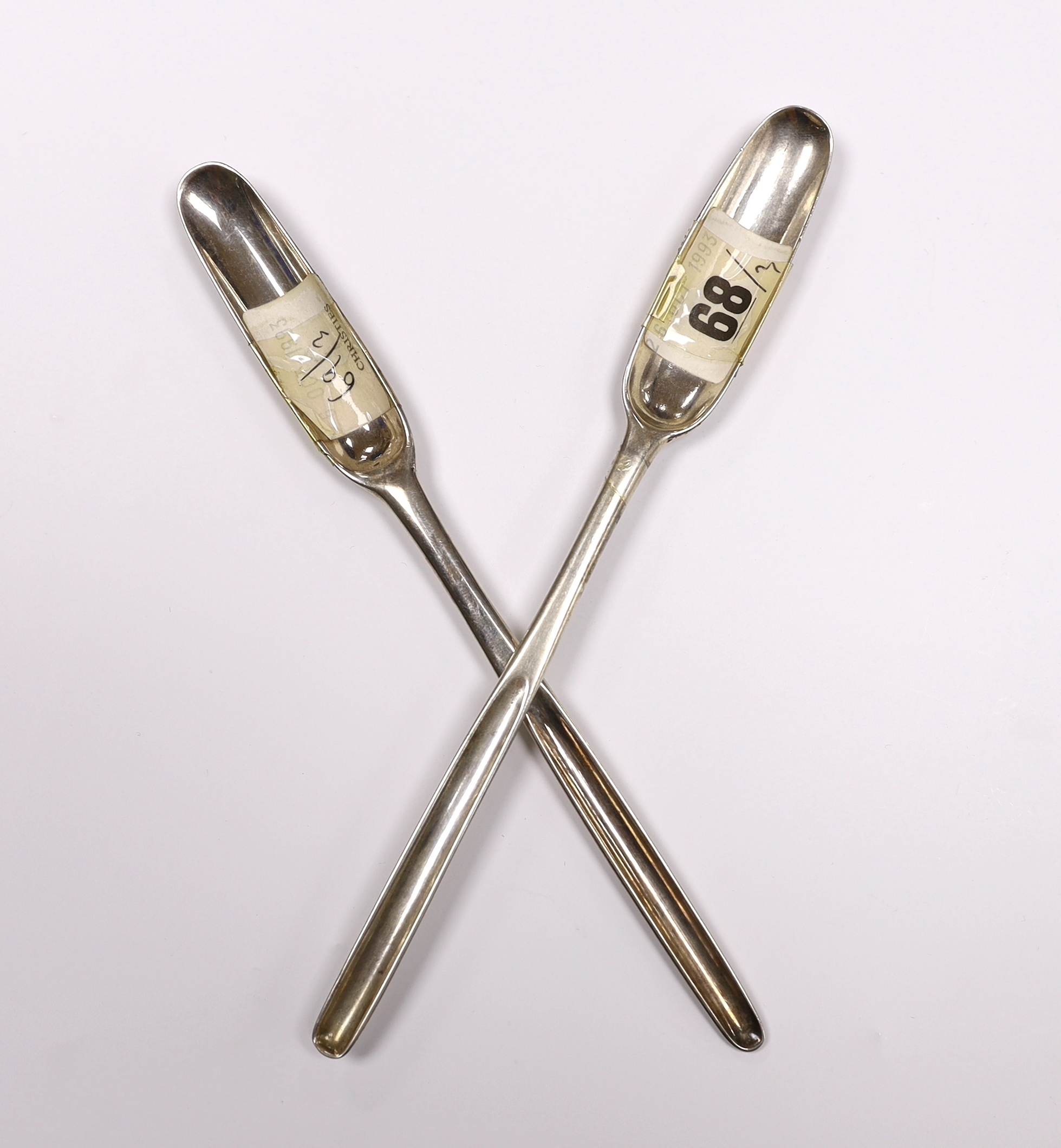 Two early 18th century silver marrow scoops, Henry Clarke I, London, circa 1720 and Andrew Archer, London, 1722, both approx. 21cm, 94 grams.